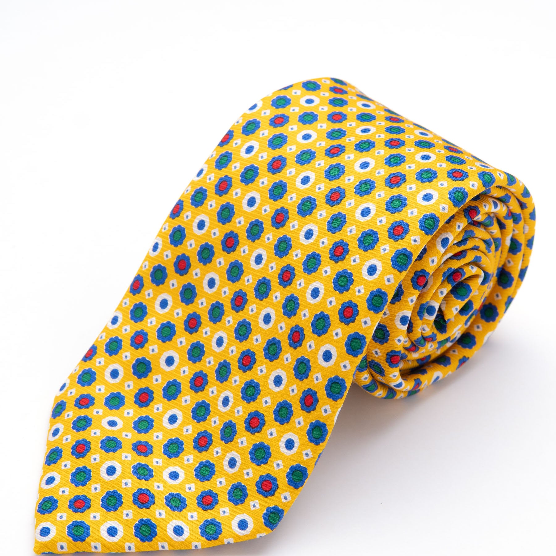 CORBATA AMARILLO CON DISEÑO DE FLORES AZULES CON PUNTOS VERDE Y ROJO