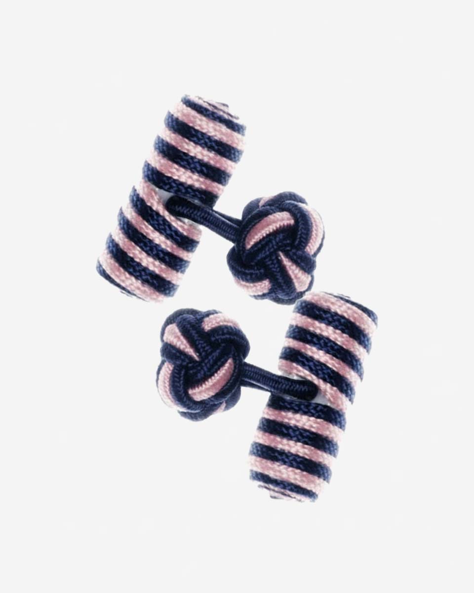 Cufflinks in the shape of a woven knot, made of metal and gold plated