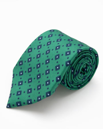 CORBATA VERDE CON DISEÑOS AZULES EN FORMA DE ROMBO
