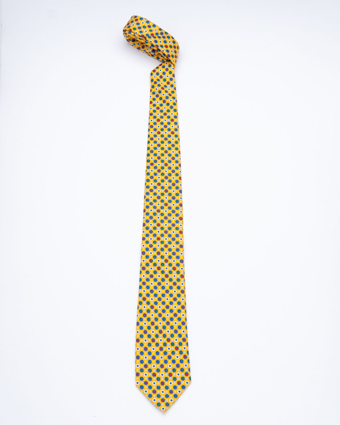CORBATA AMARILLO CON DISEÑO DE FLORES AZULES CON PUNTOS VERDE Y ROJO