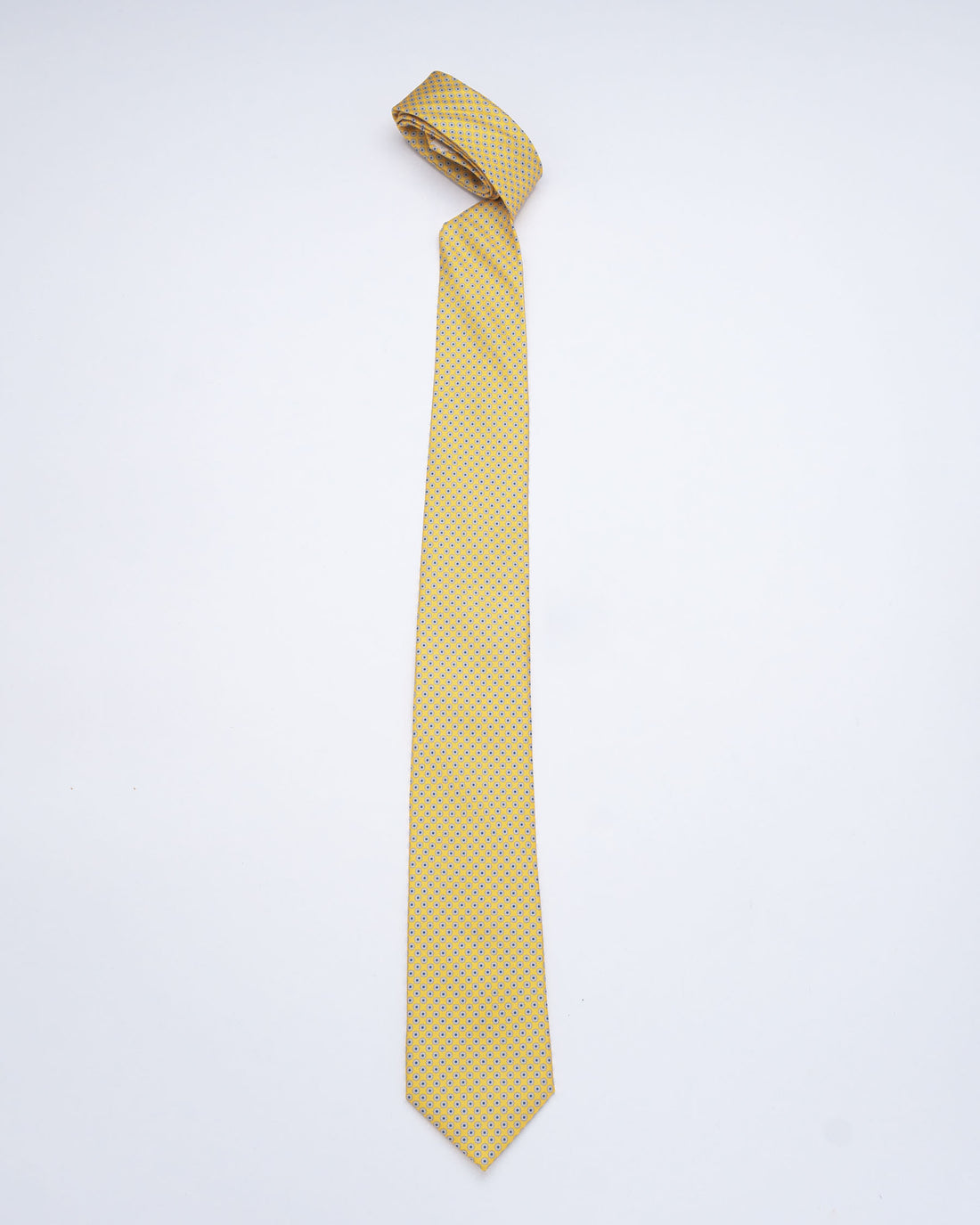CORBATA AMARILLO CON FLORES GRIS Y PUNTOS AZULES