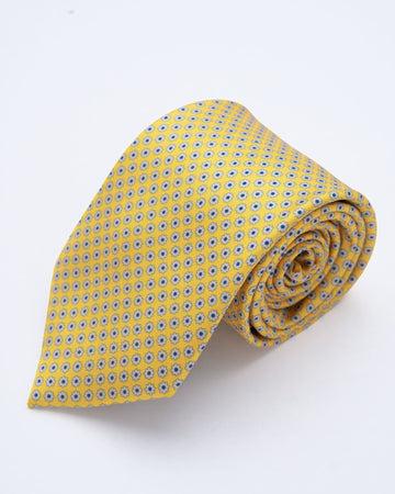 CORBATA AMARILLO CON FLORES GRIS Y PUNTOS AZULES