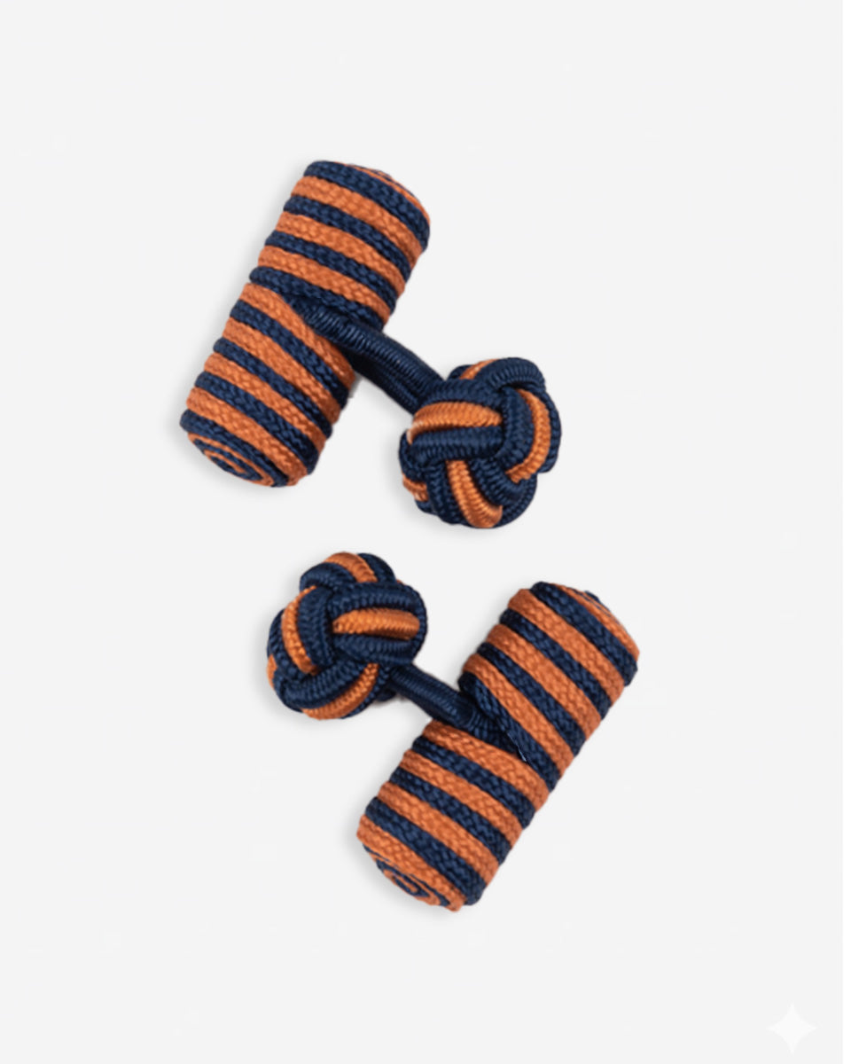 Cufflinks in the shape of a woven knot, made of metal and gold plated