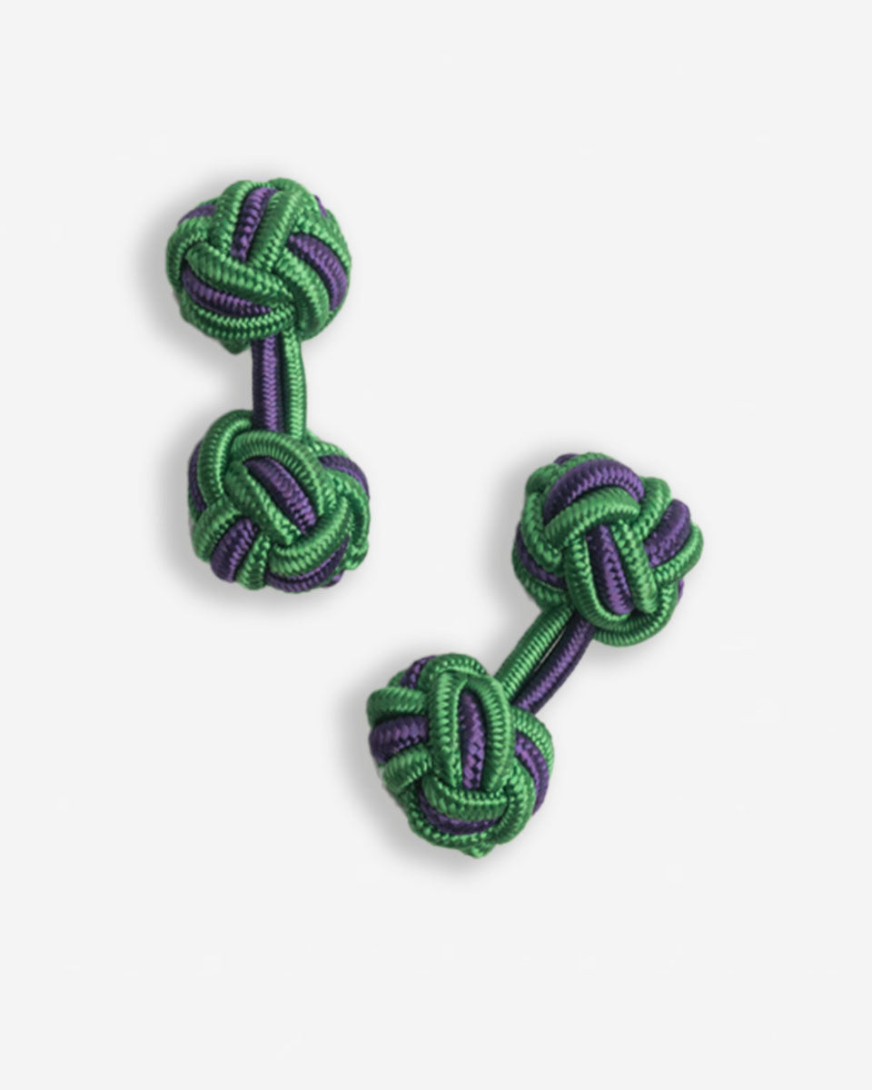Cufflinks in the shape of a woven knot, made of metal and gold plated